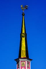 The spire of the tower and the Golden cock