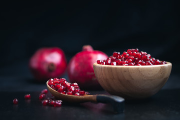 fresh pomegranate on a black background