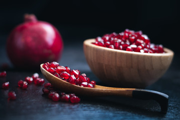 fresh pomegranate on a black background
