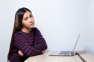 Naklejka premium Sad woman at work