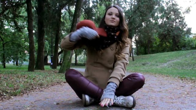 mix of two shots of the beautiful girl who throws her hat over camera,forward and backward