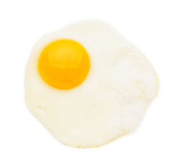 Fried egg isolated on white background top