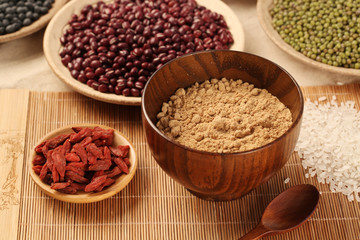 Black rice ,rice, millet, beans, goji (wolfberry)， and grind up those to make some kind of healthy food flour. It is a popular food in China, and named wugufen. 