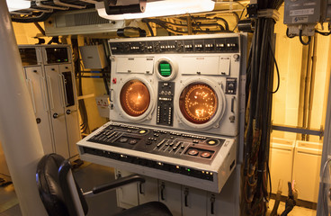 Radar screens in an old navy vessel