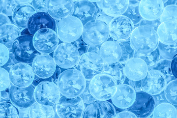 Brightly colored striped glass beads for making the background image.