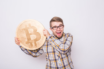 Funny bitcoin lover with big golden coin, funny miner with coins.