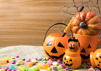 halloween party decor and dessert candy on wood ground