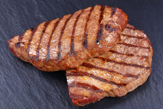 close-up of hot grilled beef steaks
