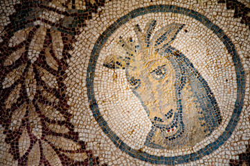 Old roman mosaics in the famous imperial Villa del Casale in Piazza Armerina, Sicily, Unesco world heritage of the 4th century A.C.