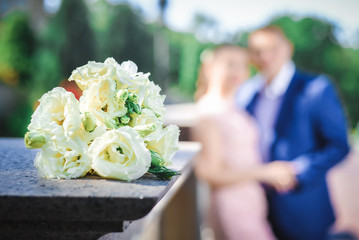 A wedding bouquet close-up on a blurred background is just married.