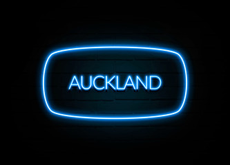 Auckland  - colorful Neon Sign on brickwall