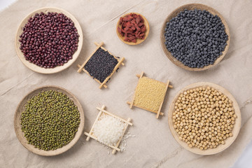 Black rice ,rice, millet, beans, goji (wolfberry)， and grind up those to make some kind of healthy food flour. It is a popular food in China, and named wugufen. 