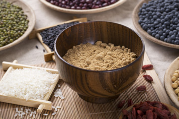 Black rice ,rice, millet, beans, goji (wolfberry)， and grind up those to make some kind of healthy food flour. It is a popular food in China, and named wugufen. 