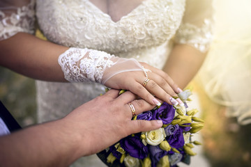 Fototapeta premium hands of a young couple in love