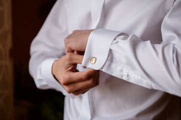 a man wearing a white shirt