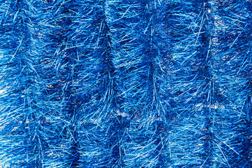 Blue background of tinsel