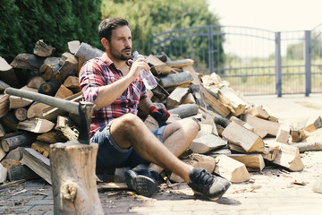 Lumberjack drinking water - Powered by Adobe