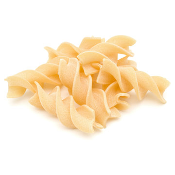 Italian  twisted pasta fusilli isolated on white background. Fusilloni, rotini.