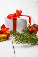 Christmas cookies and a box with a red bow.