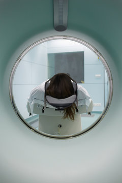 Back view of a CT scan with a patient lying on