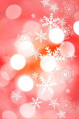 Beautiful blurred bokeh lights for Christmas and New Year celebration. Magical abstract glittery background with falling snowflakes.