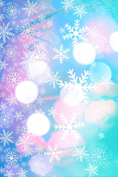 Beautiful, Christmas background with bokeh lighst and snowflakes in blue and pink colors.