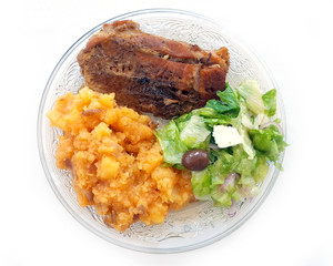 Steak with potatoes and fresh salad