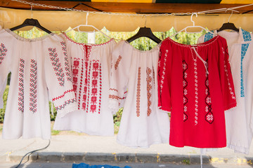Romanian traditional shirts on hangers