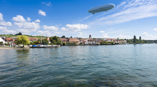 Town view of Hagenau at Lake Constance with marina, zeppelin and bank view - Hagnau, Lake Constance, Baden-Wuerttemberg, Germany, Europe