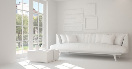 Fototapeta premium Idea of white room with sofa and summer landscape in window. Scandinavian interior design. 3D illustration