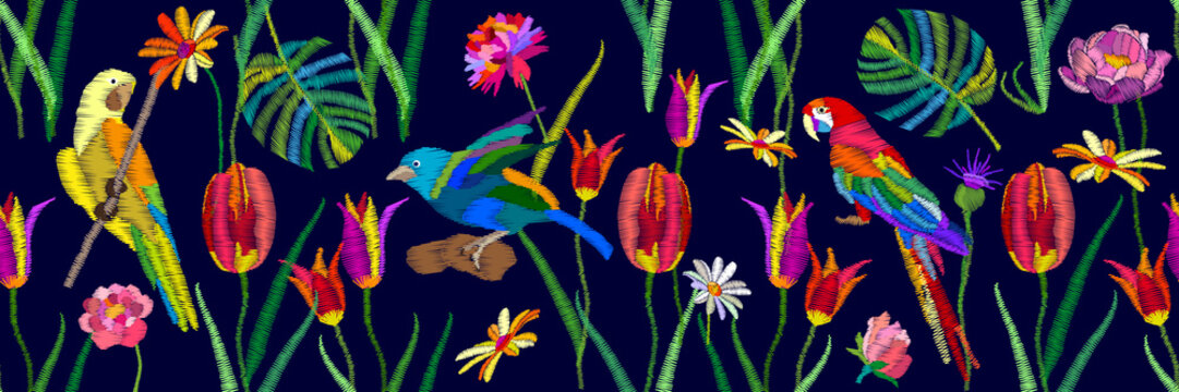 Colorful birds in the tropical garden.