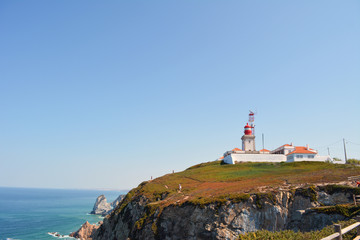 Fototapeta na wymiar Lighthouse and cliffs at Cape St. Vincent.