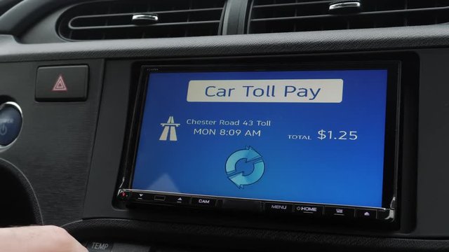 Paying for the toll road directly from the car on the main screen.