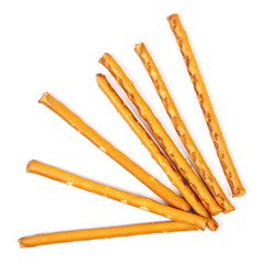 Salty cracker pretzel sticks isolated on white background, top view