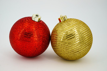 two christmas balls red and gold