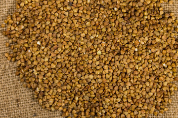 Buckwheat on sackcloth woven bsckground