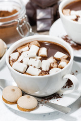 cups of hot chocolate with marshmallows, vertical top view