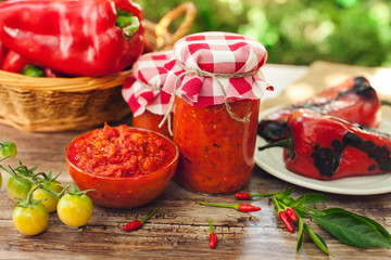 Delicious ajvar in bowl and jar