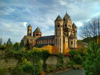 Old medieval benedictine Abbey in Maria Laach, Germany, first founded in 1093 - front view - obrazy, fototapety, plakaty