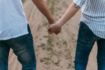  hand in hand man and woman