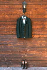 groom's costume on a wooden background