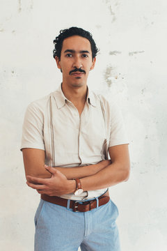 Indoor Portrait of Handsome Young Hispanic Man