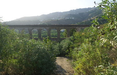 Fototapeta na wymiar Aqueduct in Almunecar, Granada province, Andalusia, Spain 