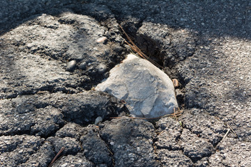 Street with destroyed tarmac