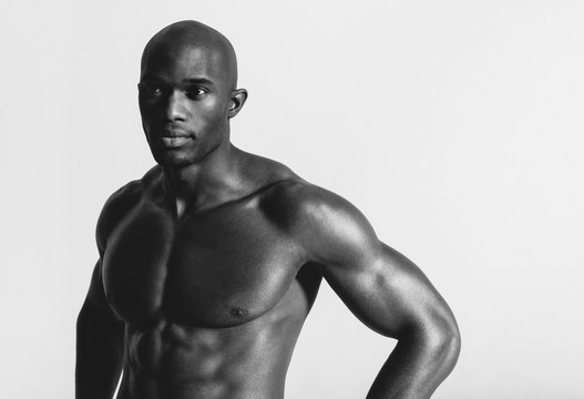 Physically fit muscular man looking away