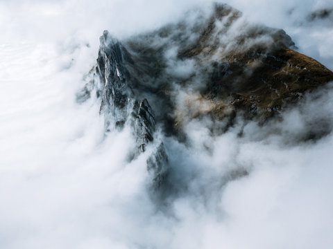 Aerial view of mountain covered with clouds