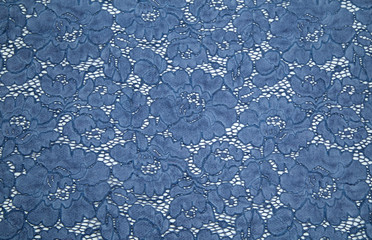  Pale blue, blue guipure in unfolded form on a white table