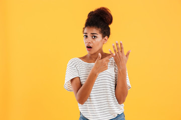 Displeased woman showing at her ring finger isolated