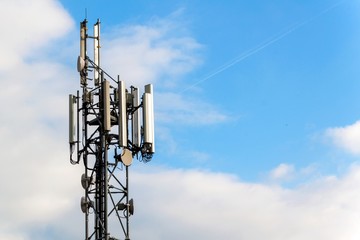 gsm column on a blue sky background. Mediation of the telephone signal. Modern technology.