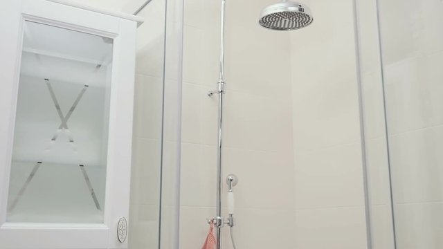 The shower cabin in the bathroom